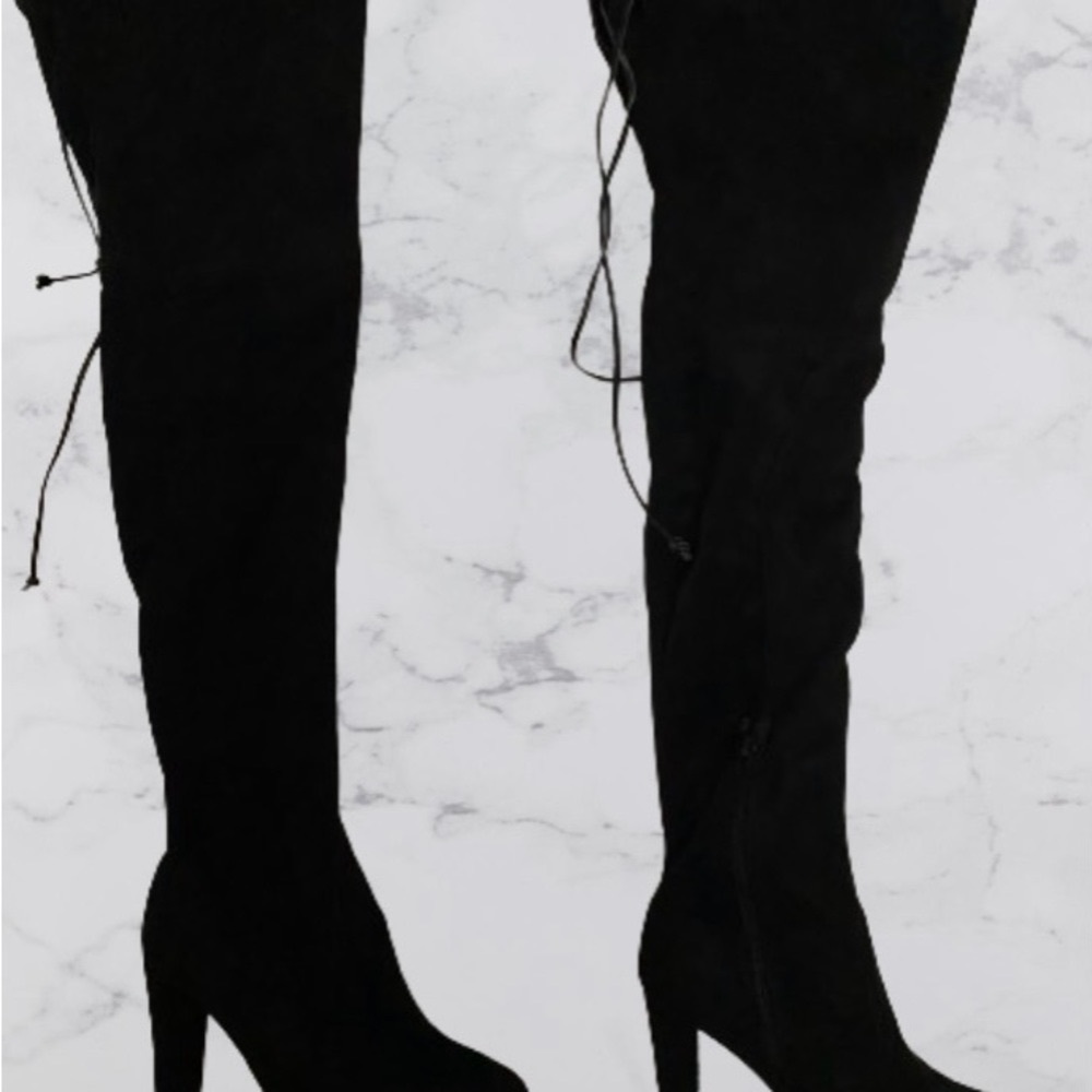 Black suede, thigh high, tie, 4 inch heel, zipper on the lower inside of boots
